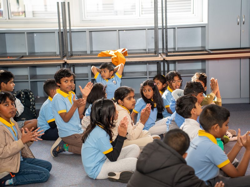 Students joining together in devotion